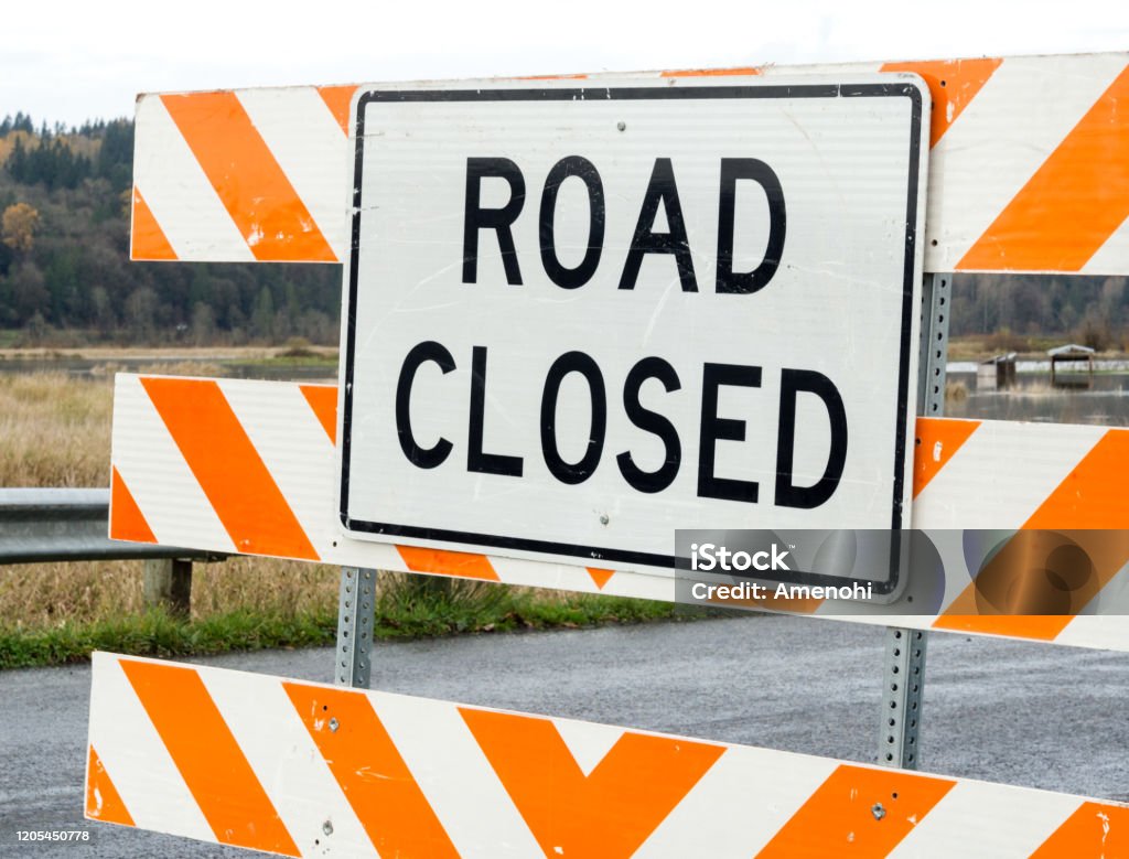 Road closed traffic sign Road closed traffic sign on the street Road Closed Sign Stock Photo