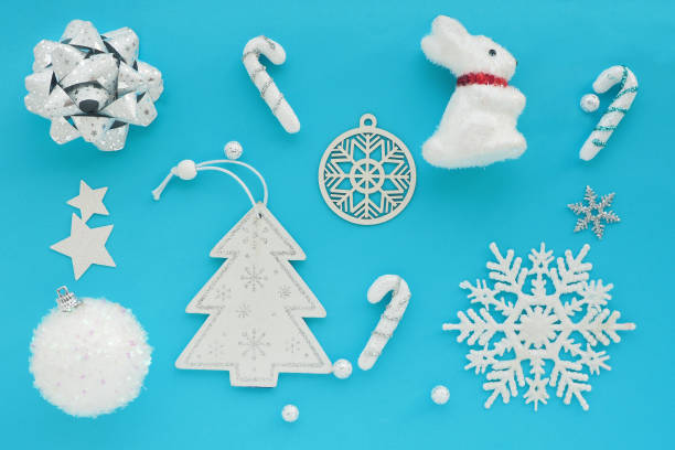 istock Christmas winter composition. Pattern of Christmas decorations on a blue background.  Flat lay, top view. 1205457044