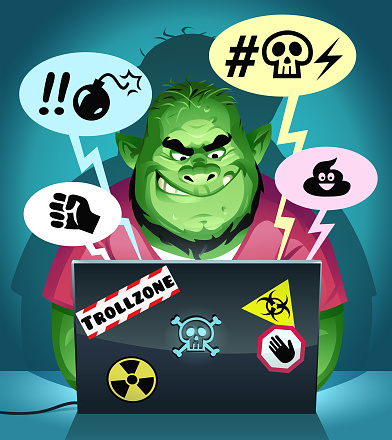 Vector illustration of a green troll with a neckbeard sitting in his dark room using a laptop computer, posting mean comments on social media. Concept for online trolling, cyberbullying, online harassment, rudeness, social media, fake news and communication.