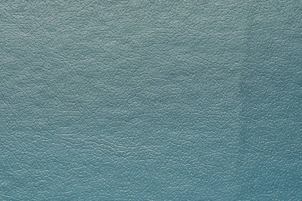 istock Synthetic blue leather for background. Close-up texture decoration material 1205459901