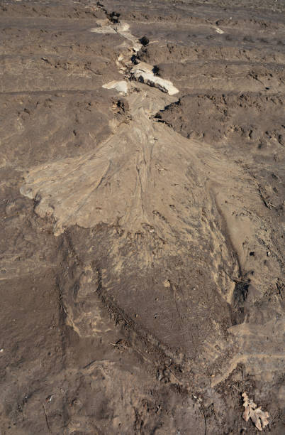 istock Water erosion. Close-up on soil erosion. 1205460572