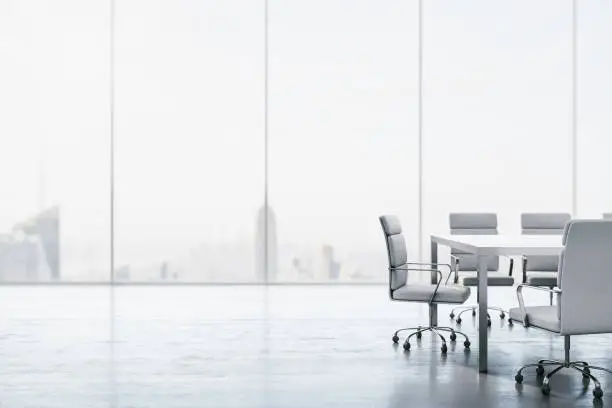 Photo of Furnished white conference room with table, chairs and large window overlooking the city. 3D Rendering