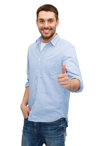 istock smiling man showing thumbs up 1205470451
