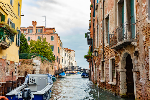 Boats on the famous canals of Venice Italy that serve as the roads of the city
