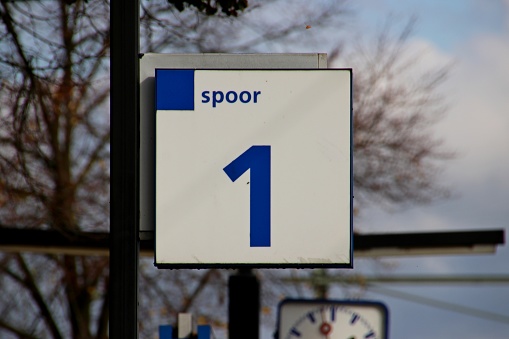 Platform number 1 on blu and white sign at station 't Harde  in the Netherlands