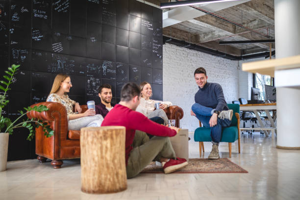 istock Coworkers on a coffee break enjoying their time talking 1205473410