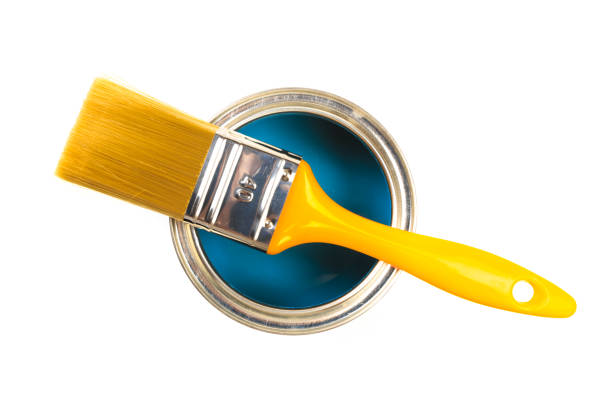 istock Can with blue  paint and brush isolated on white background top view - Image 1205473765