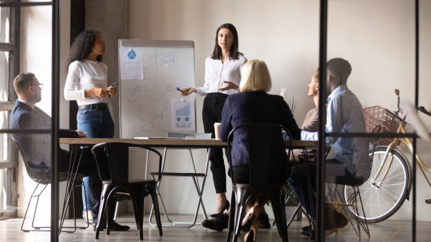 istock Two millennial diverse confident women speakers trainers led educational seminar 1205475132