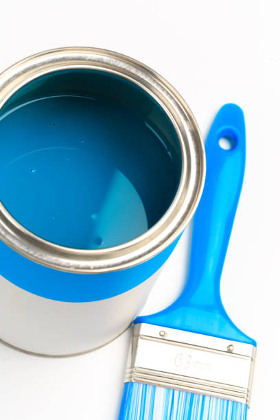 istock Can with blue paint with brush  isolated on white background - Image 1205475333