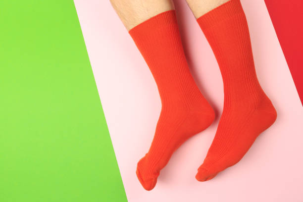 istock legs in colorful socks on colorful  background 1205476213