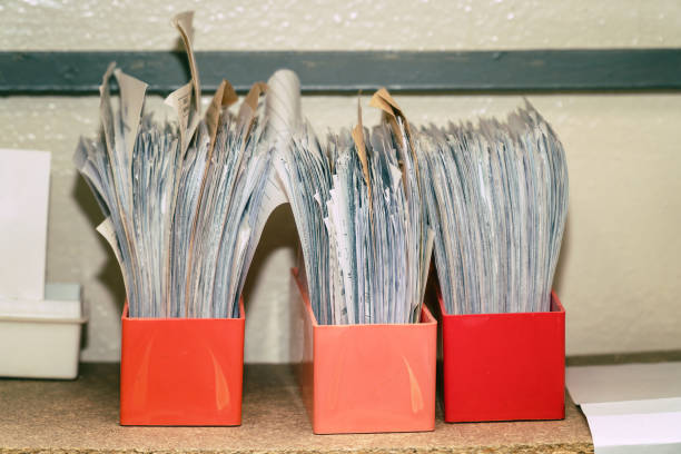istock Business papers are on the shelf in box 1205478096