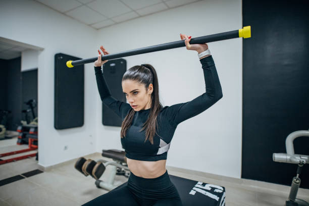 istock One sportswoman doing weightlifting 1205478301