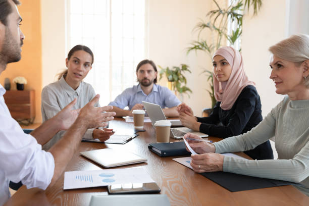 istock Multiracial colleagues brainstorm discussing ideas at meeting 1205480390