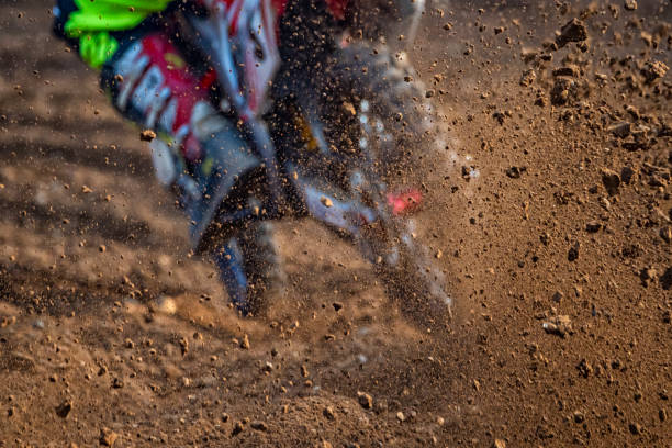 istock Motocross scene on a trail 1205480614