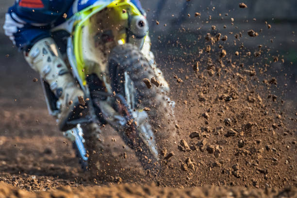 istock Motocross scene on a trail 1205480618