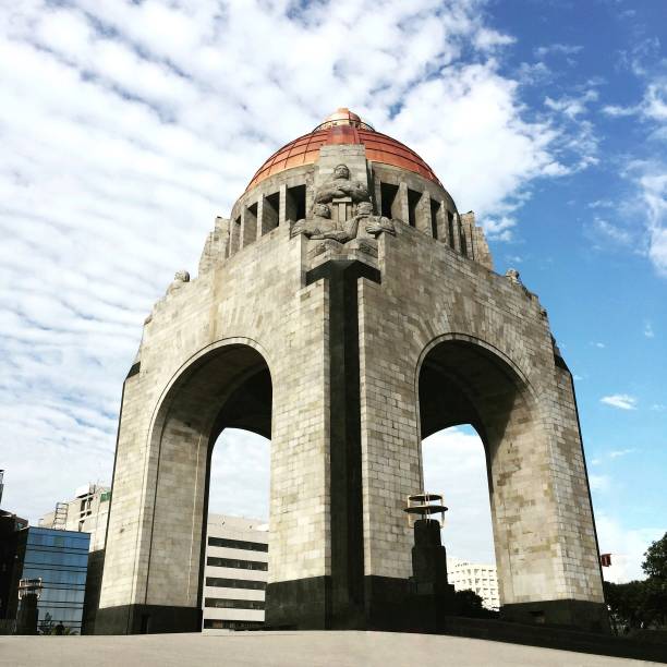 Monument of the Revolution in Mexico City on a bright summer day Isometric angle of the "Monumento a la Revolución", historic monument about the Mexican revolution of 1910. Popular touristic destination in downtown Mexico City. revolution photos stock pictures, royalty-free photos & images