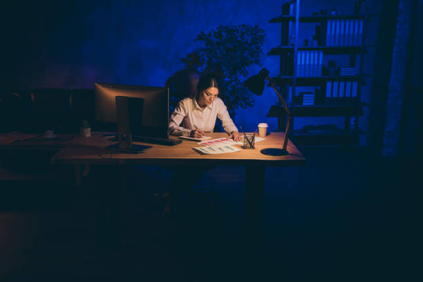 istock Nice attractive stylish focused lonely single lady hardworking top executive manager analyst marketer financier analyzing data preparing report alone at night dark work place station indoors 1205481920