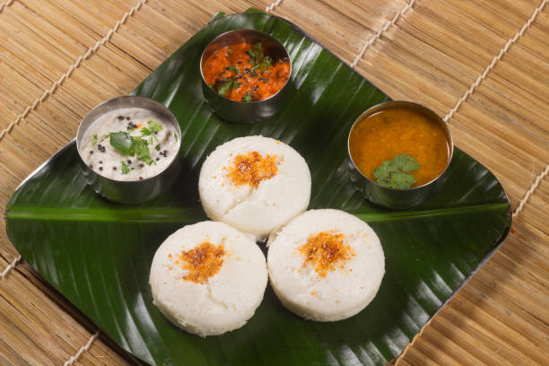 istock Idli with both sambar and coconut chutney. South Indian breakfast or snack dish 1205482245
