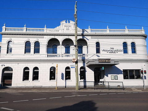 Exterior view of the old fashioned Village Belle hotel in St Kilda, Melbourne, Victoria