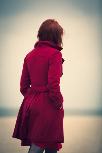 Red haired girl by the beach