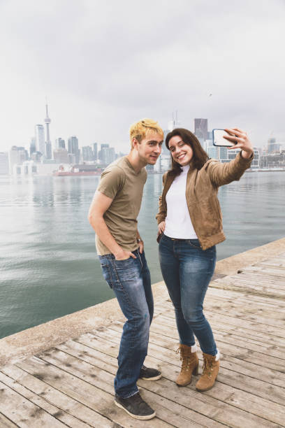 istock Couple with Toronto skyline 1205484269