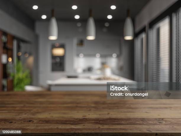 Wood Empty Surface And Kitchen As Background In The Evening Stock Photo - Download Image Now