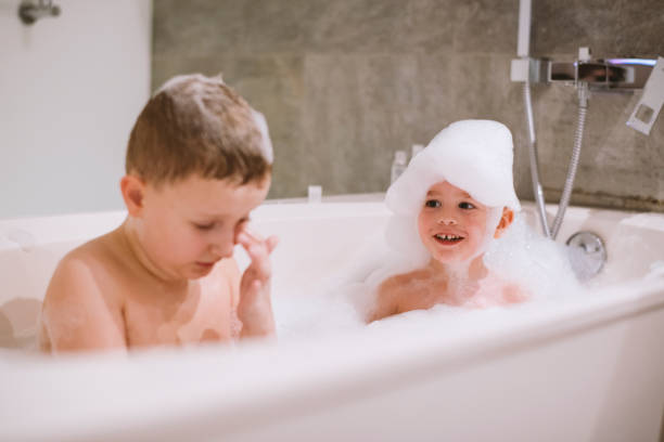istock Boys playing in the bathtub 1205488291