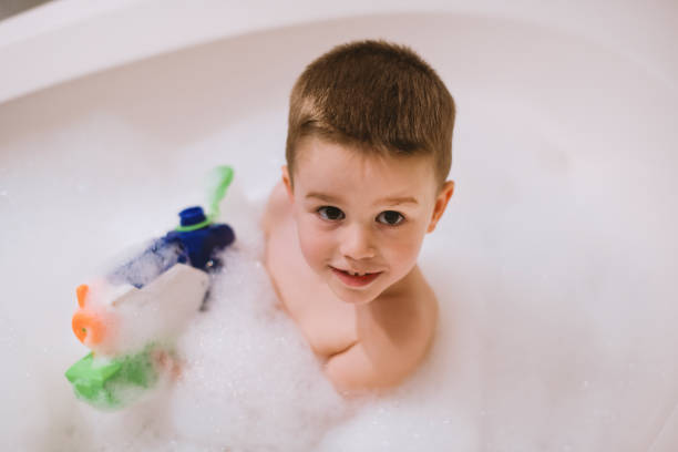 istock Boy in the bathtub 1205489564