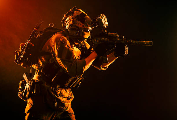 istock Anti terrorism forces fighter with assault rifle 1205490510