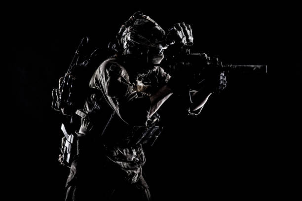 istock Anti terrorism forces fighter with assault rifle 1205490561