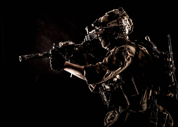 istock Anti terrorism forces fighter with assault rifle 1205490584