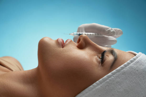 istock Cosmetic hyaluronic injection in lips. 1205490627