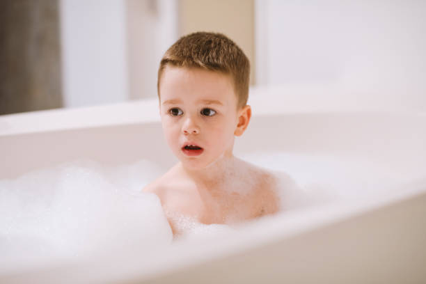 istock Boy in the bathtub 1205491351