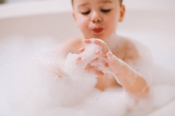 istock Boy in the bathtub 1205492434