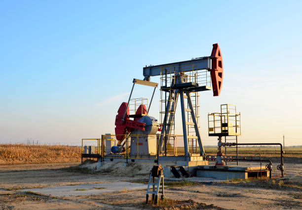 istock Oil drill rig and pump jack 1205492858