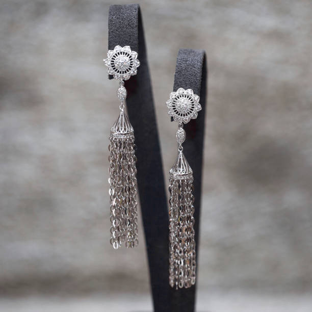 istock diamond earrings on the stand 1205494911