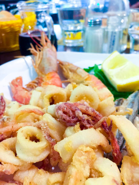 istock Italian Mixed fried fish, shrimp and squid platter 1205496415
