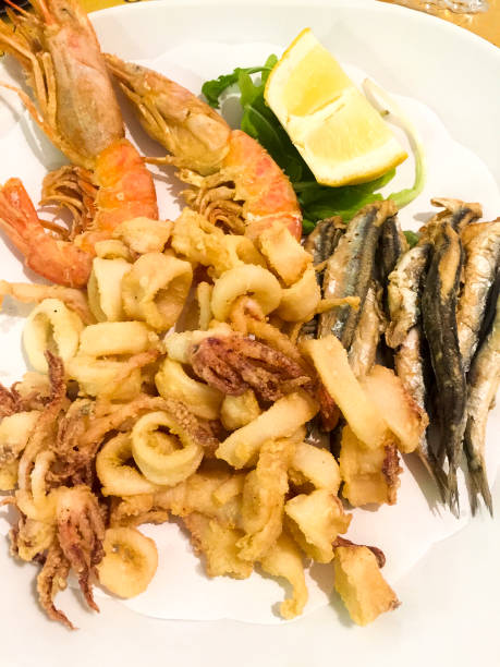 istock Italian Mixed fried fish, shrimp and squid platter 1205496422