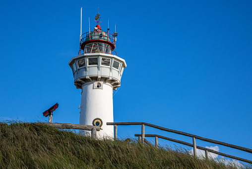 Lighthouse on the beach in Egmond aan Zee in the Netherlands