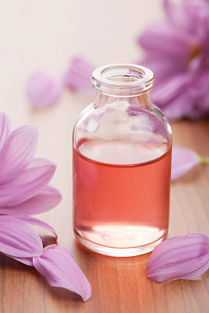 istock essential oil and flowers 120550015