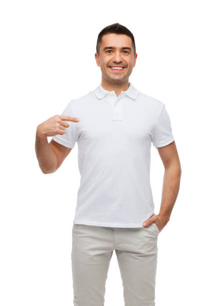 istock smiling man in t-shirt pointing finger on himself 1205502124