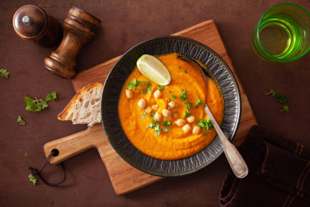 istock creamy carrot chickpea soup on dark rustic background 1205504132