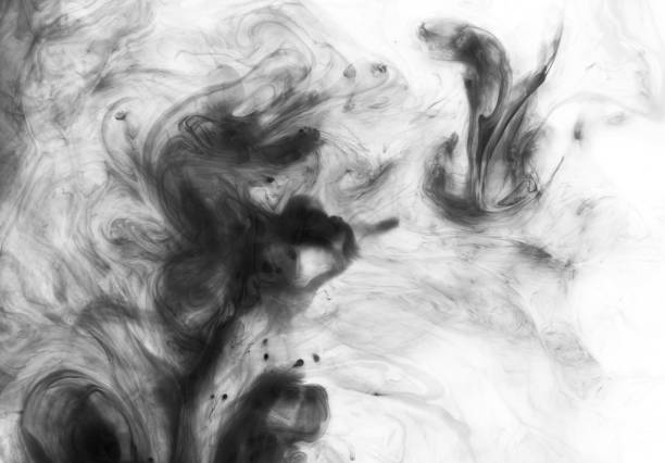 Black abstract marbling ink stains on white background.