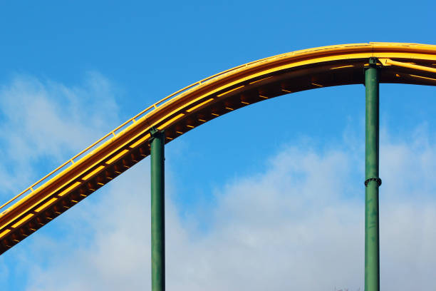 istock Roller coaster against blue sky background. Amusement park attractions. 1205508815