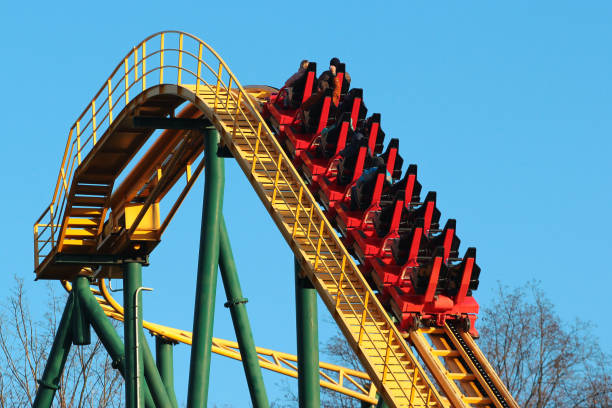istock Roller coaster against blue sky background. Amusement park attractions. 1205508836
