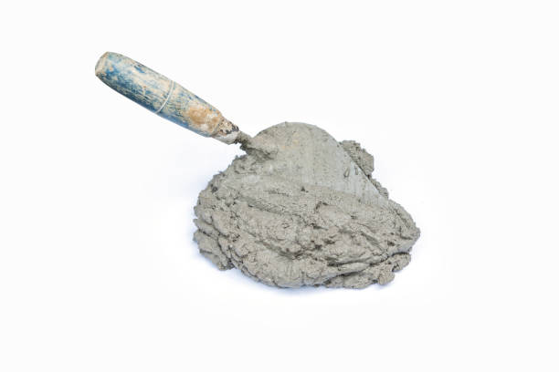 istock Cement or mortar, Cement mix with a trowel 1205511914