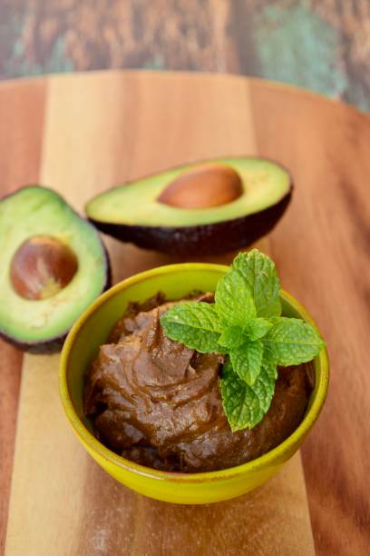 istock Vegan avocado chocolate mousse garnish with mint leaf 1205513766