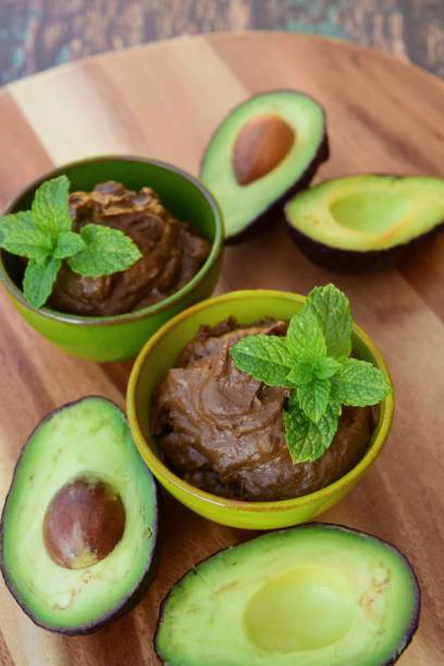 istock Vegan avocado chocolate mousse garnish with mint leaf 1205513799