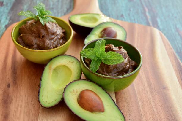 istock Vegan avocado chocolate mousse garnish with mint leaf 1205513823