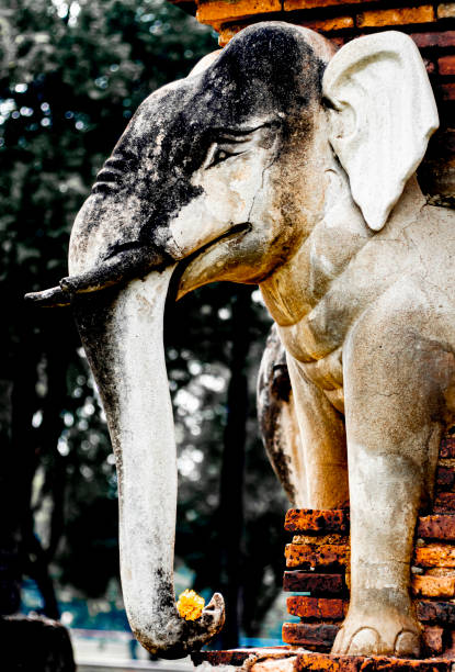 istock Wat Sorasak chedi surrounded by elephants. CHEDI WAT CHANG LOM (Elephant Temple).Sukhothai Historical Park 1205527232